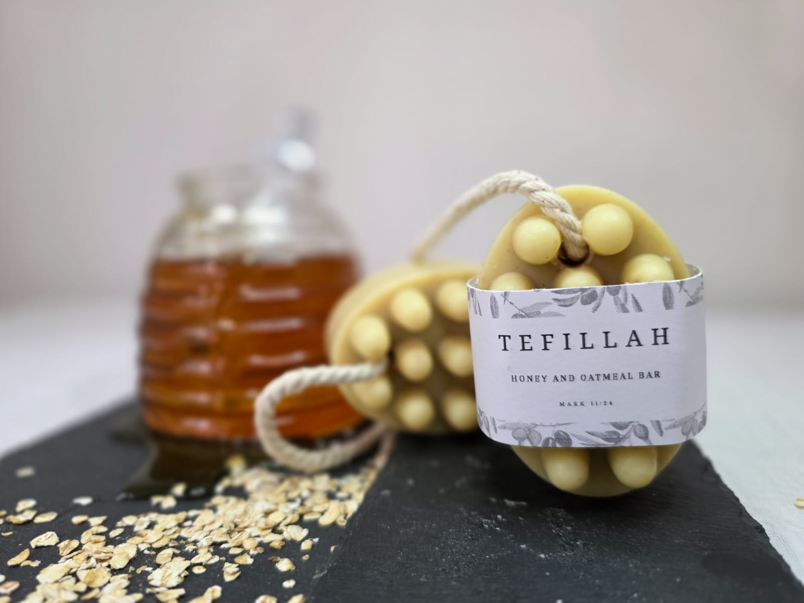 Homemade honey and oatmeal soap on a rope handcrafted by Tefillah Handmade Products, soothing for sensitive and eczema-prone skin