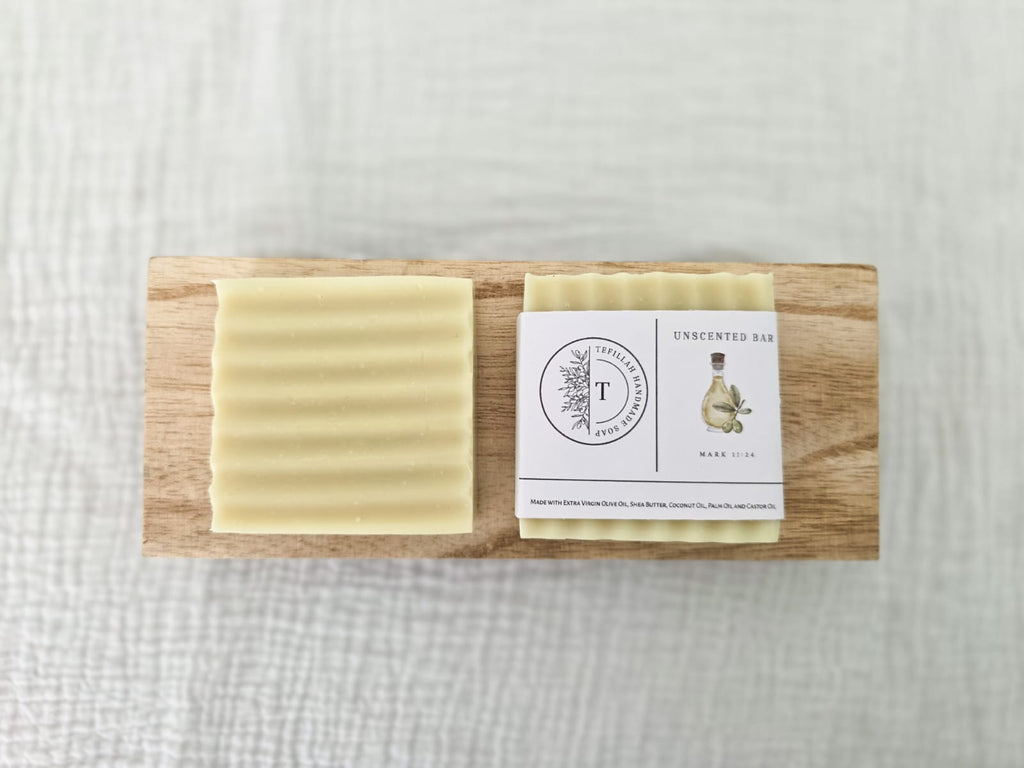 Close-up of Tefillah handmade unscented soap bar showing natural texture, made with olive oil and shea butter