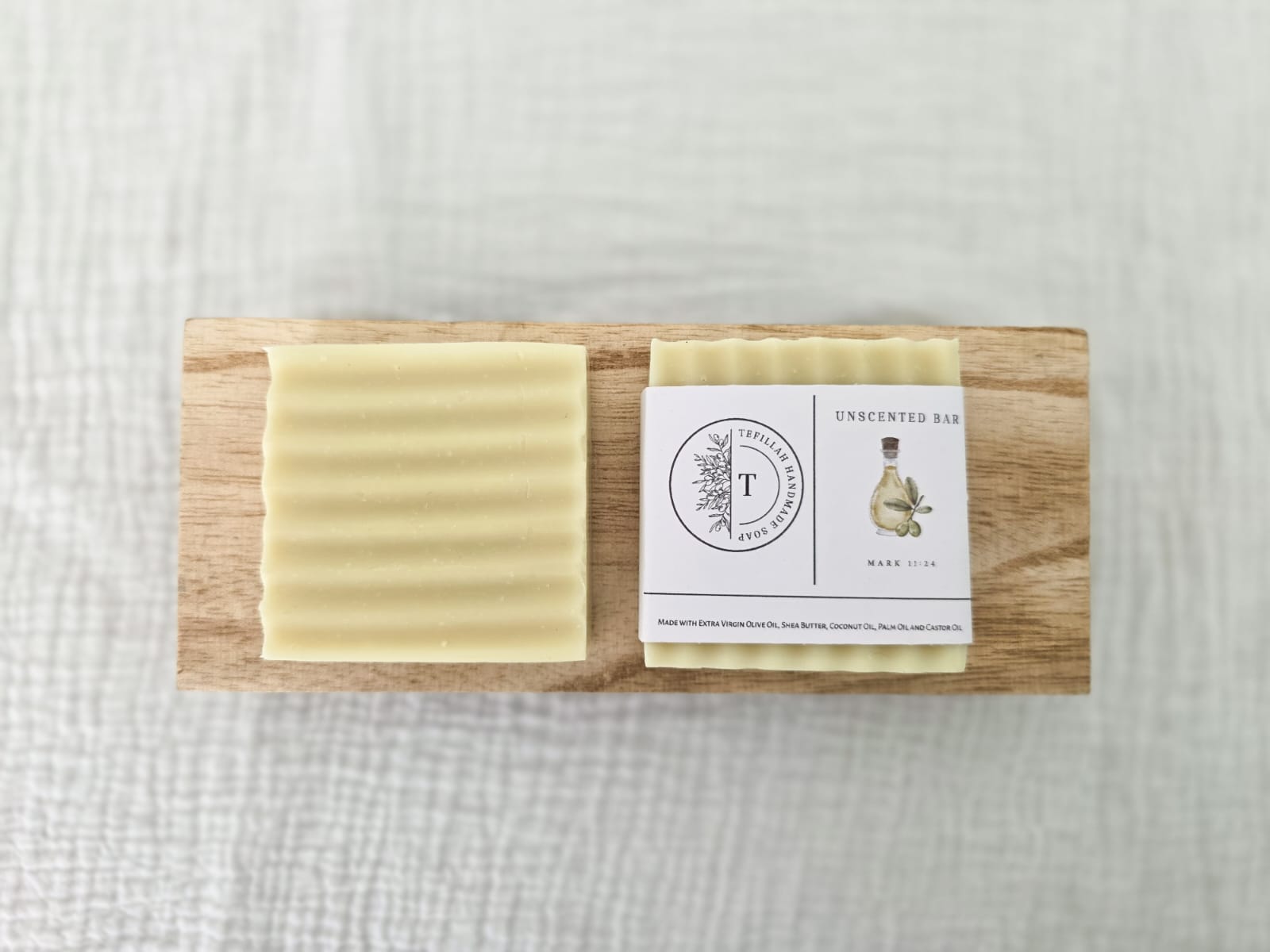 Close-up of Tefillah handmade unscented soap bar showing natural texture, made with olive oil and shea butter