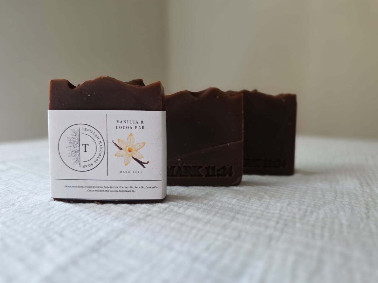 Close-up of Homemade Vanilla and Cocoa Soap Bar, handcrafted with natural oils and vanilla fragrance