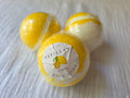 Handmade lemon bath bomb by Tefillah Handmade Products, infused with lemon essential oil and coconut oil for an uplifting, mood-boosting bath experience