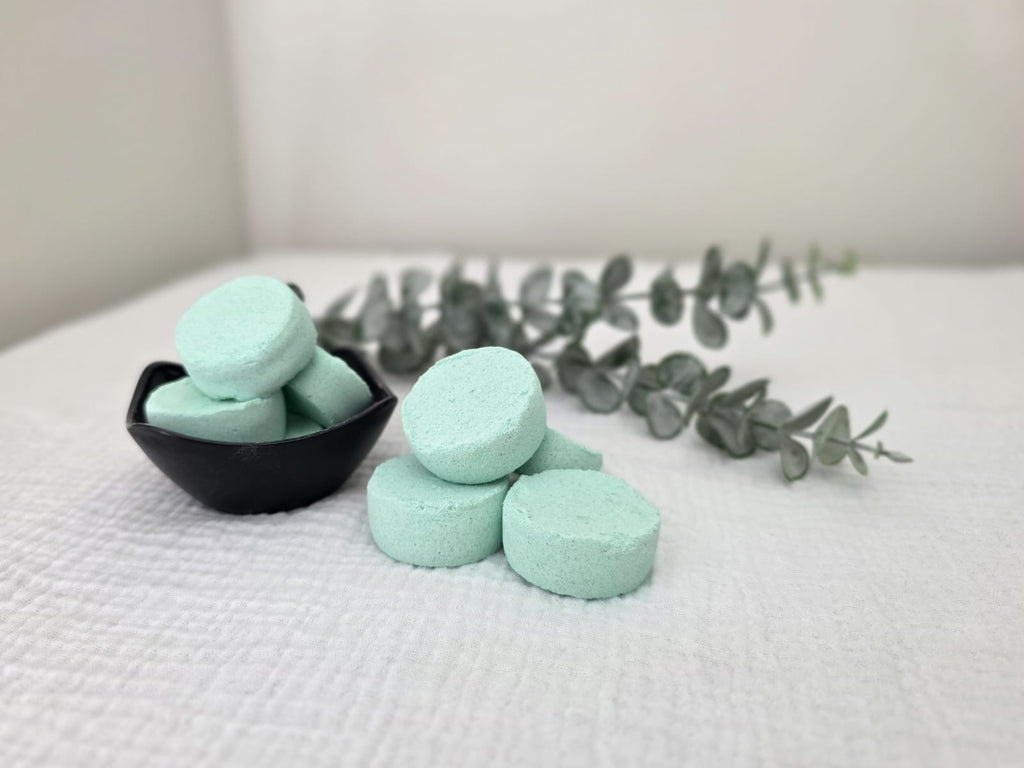 Eucalyptus and menthol shower steamer fizzing in shower for sinus relief